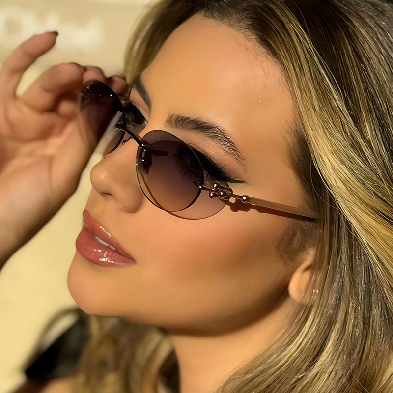 新しいメタルフレームレスオーバル女性サングラス高級ブランドデ - Street Fashion Brands のレビューと価格